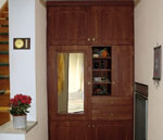 Garderoben-Einbauschrank aus Fichtenholz, gewachst (Mahagoni) Bild 1