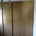 Einbauschrank mit Schiebetüren aus Dekorspanplatte Bild 2